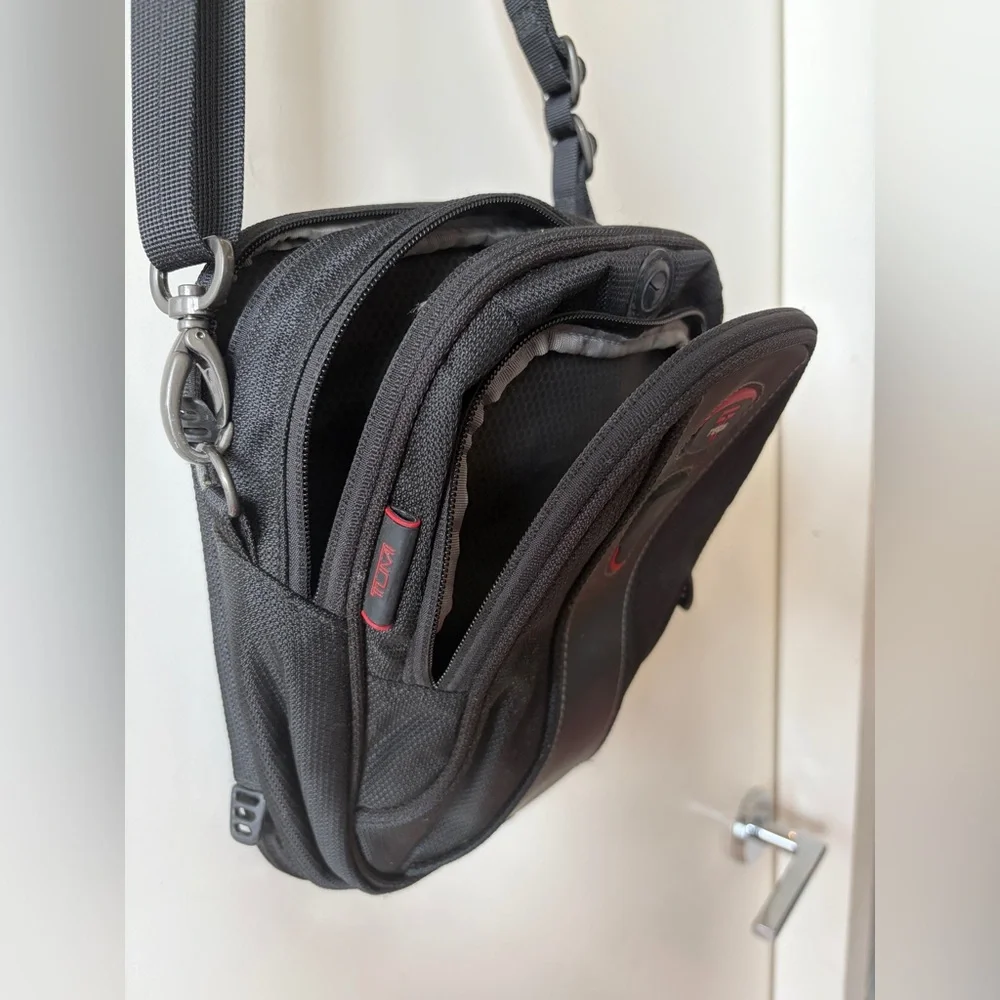 Tumi T-Tech sling bag with multiple compartments and Keychain mens